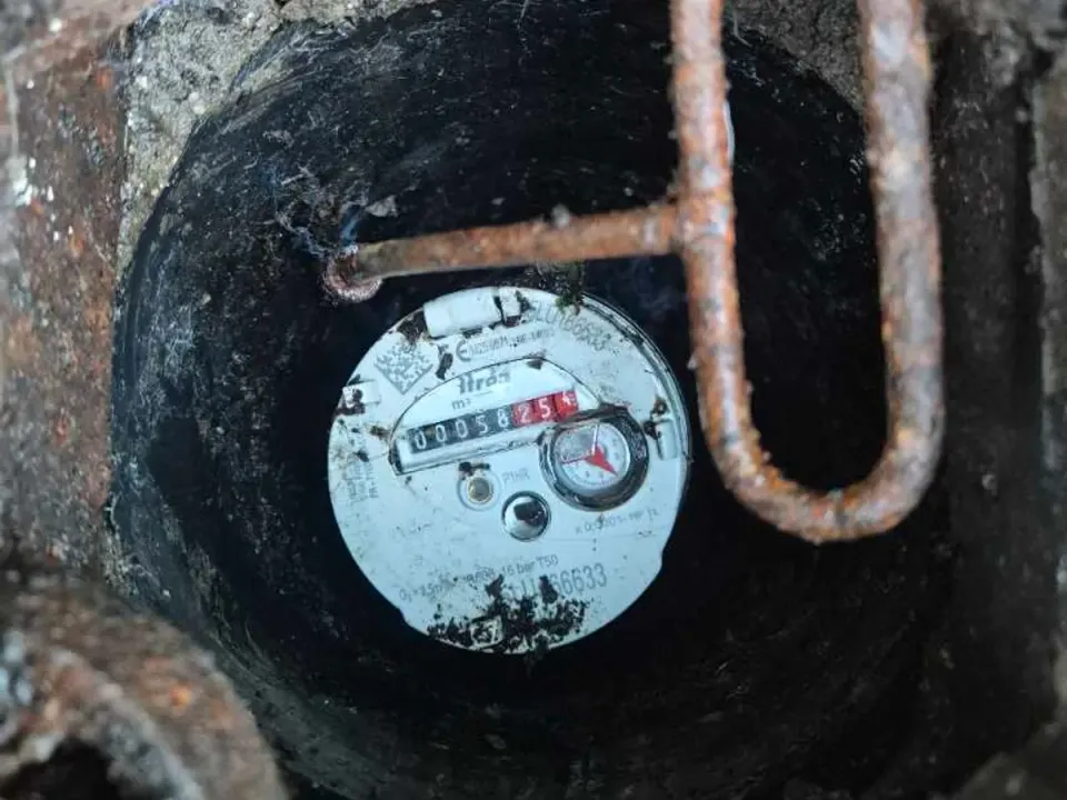 External water meter showing movement during leak detection investigation