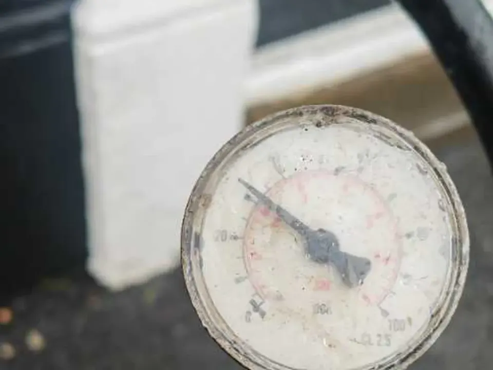 Pressure gauge on mains supply confirming no further loss after works completed