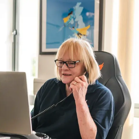 An ADI Leak Detection advisor taking a call